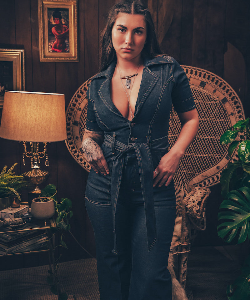 foxy Lola Love stretch denim bell bottom  jumpsuit with belted waist, front pockets, and a bold 70's inspired silhouette for effortless retro cool by soul sister since 1969