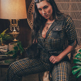 Knit plaid diva jumpsuit with contrasting denim front pockets, collar, and belt, blending retro 70's charm with bold, modern flair.