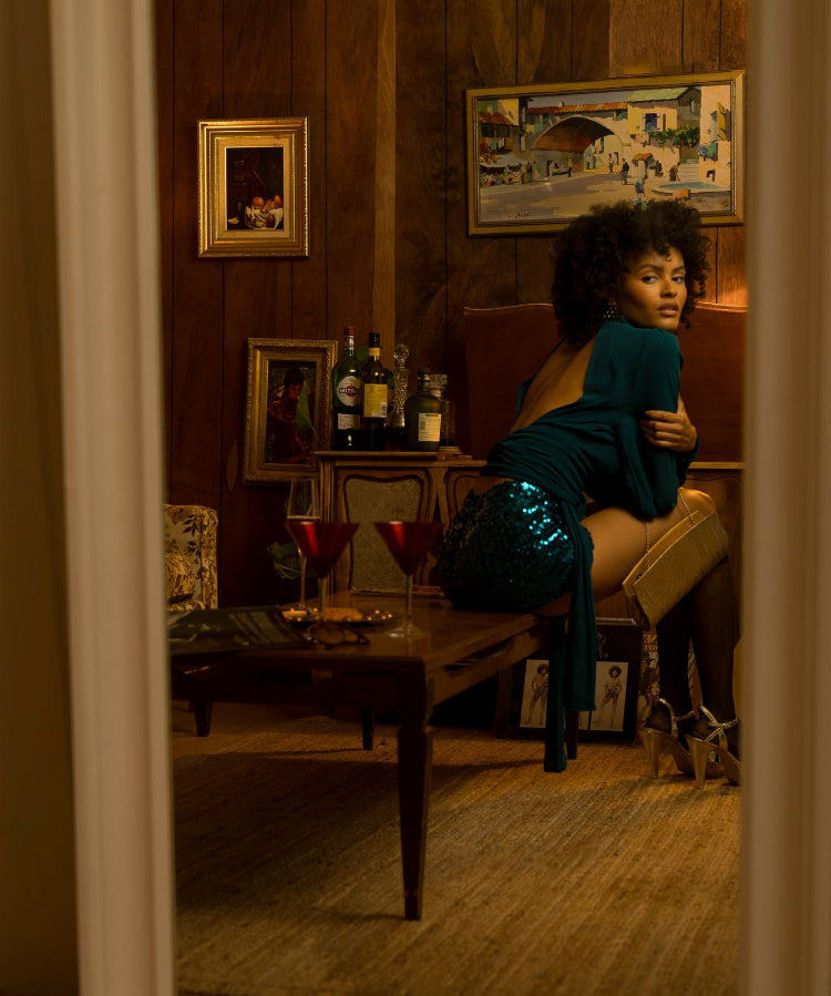Soul Sister since 1969- Mary Gold Peek backless peek boo blouse teal with wrap detail, turtle neck, and long tulip sleeves, a sophisticated and sexy 70's inspired statement piece