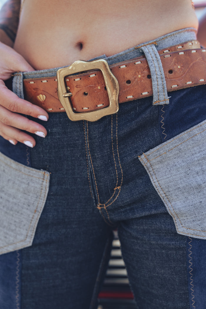 Janice patchwork denim bell bottom jeans in navy, side angle showing the flare