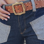 Janice patchwork denim bell bottom jeans in navy, side angle showing the flare