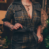 Knit plaid diva jumpsuit with contrasting denim front pockets, collar, and belt, blending retro 70's charm with bold, modern flair.