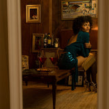Soul Sister since 1969- Mary Gold Peek backless peek boo blouse teal with wrap detail, turtle neck, and long tulip sleeves, a sophisticated and sexy 70's inspired statement piece