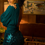 Soul Sister since 1969- Mary Gold Peek backless peek boo blouse teal with wrap detail, turtle neck, and long tulip sleeves, a sophisticated and sexy 70's inspired statement piece