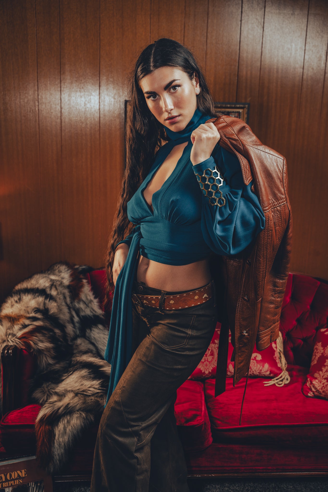 Soul Sister since 1969- Mary Gold Peek backless peek boo blouse teal with wrap detail, turtle neck, and long tulip sleeves, a sophisticated and sexy 70's inspired statement piece