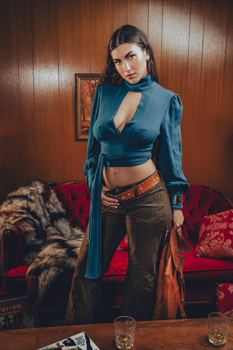 Soul Sister since 1969- Mary Gold Peek backless peek boo blouse teal with wrap detail, turtle neck, and long tulip sleeves, a sophisticated and sexy 70's inspired statement piece