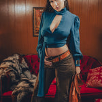 Soul Sister since 1969- Mary Gold Peek backless peek boo blouse teal with wrap detail, turtle neck, and long tulip sleeves, a sophisticated and sexy 70's inspired statement piece