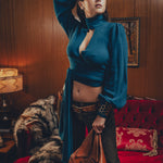 Soul Sister since 1969- Mary Gold Peek backless peek boo blouse teal with wrap detail, turtle neck, and long tulip sleeves, a sophisticated and sexy 70's inspired statement piece