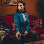 Soul Sister since 1969- Mary Gold Peek backless peek boo blouse teal with wrap detail, turtle neck, and long tulip sleeves, a sophisticated and sexy 70's inspired statement piece