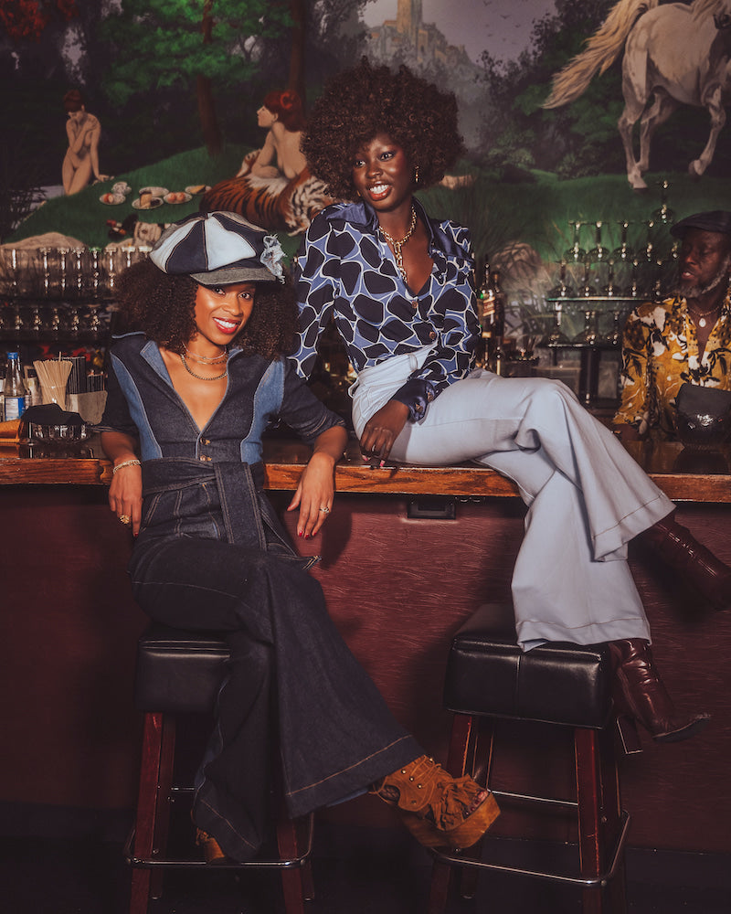 a plunging neckline  with an oversized collar Two-Tone Denim  70s style Jumpsuit  by Soul Sister since 1969