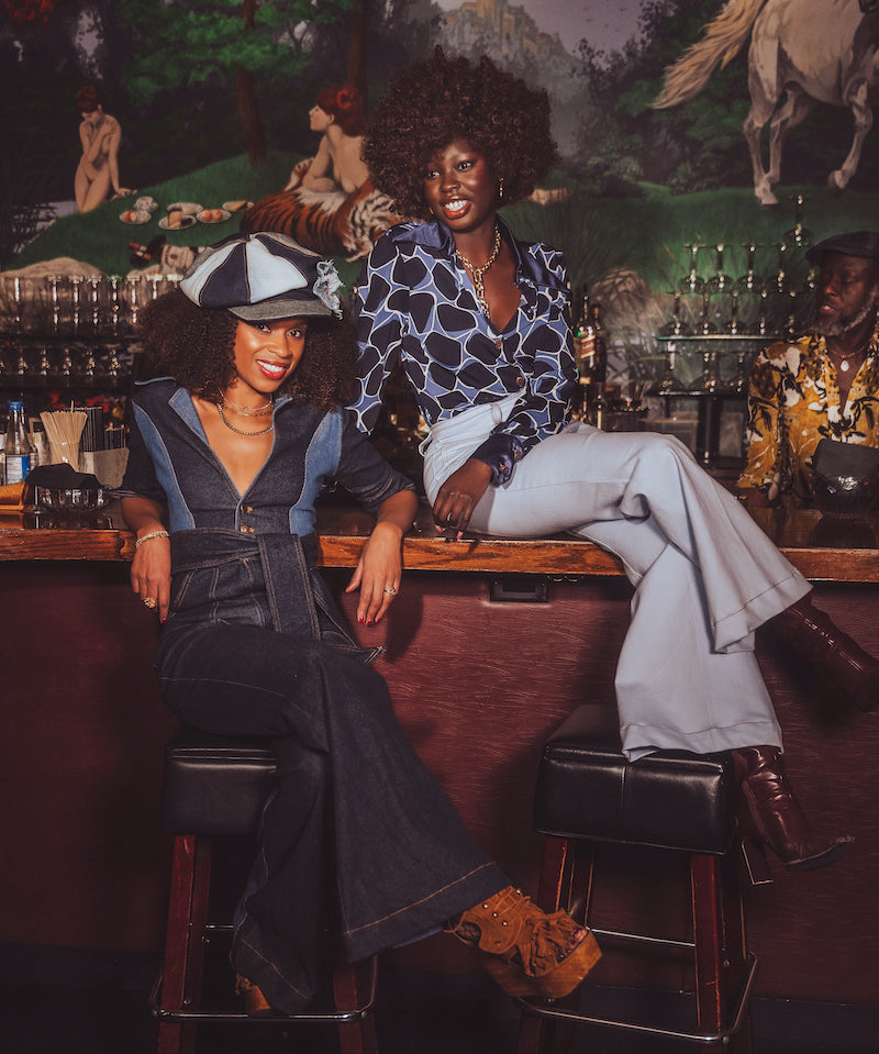 a plunging neckline  with an oversized collar Two-Tone Denim  70s style Jumpsuit  by Soul Sister since 1969